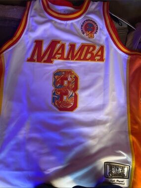 Classic White Mamba Basketball Jersey with Red and Yellow Accents